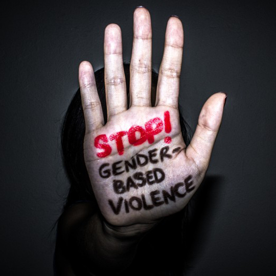 hand painted with words stop gender based violence